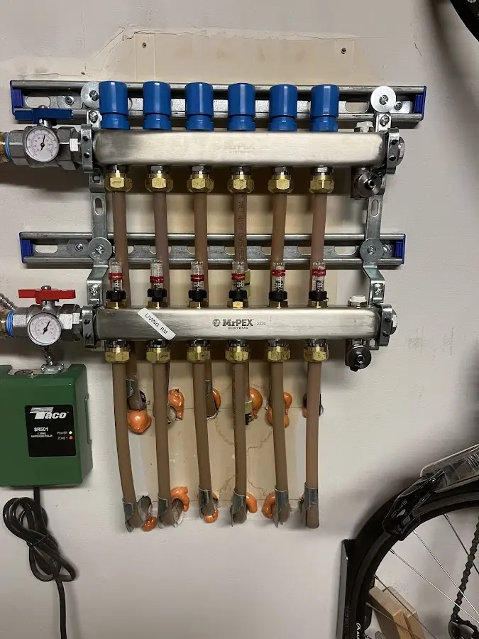 Plumber performing Water Heater Repair at a residential property in Air Force Academy